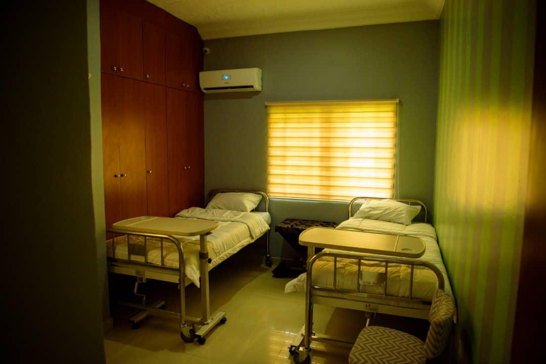 A bright, quiet bedroom with morning light through the window