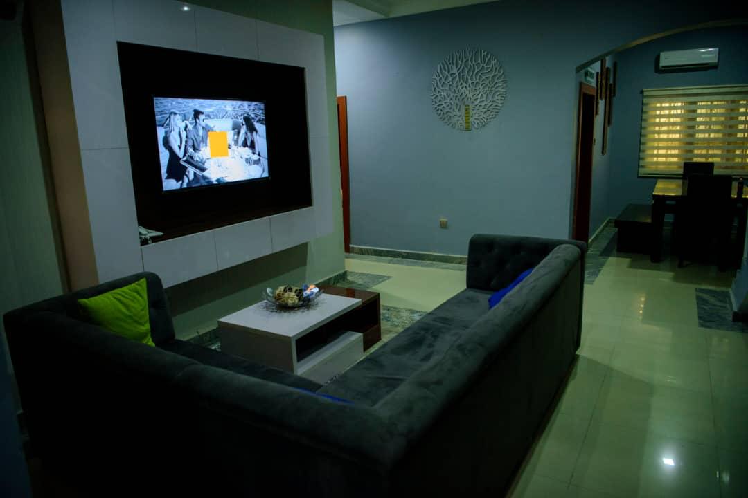 A calm, softly lit therapy office with comfortable seating for private consultations